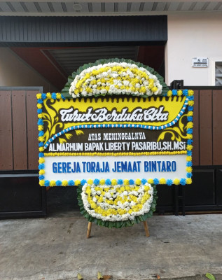 Papan Bunga Duka di Batang Toru
